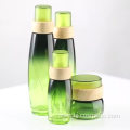 OEM & ODM glass Pump sleeve plating lotion bottle cream bottle